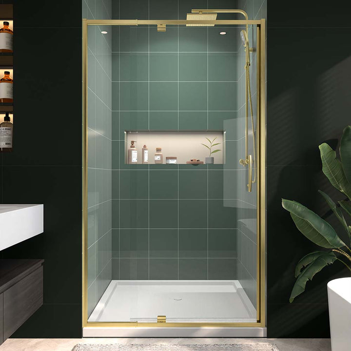 Modern gold framed glass shower door front view in green bathroom