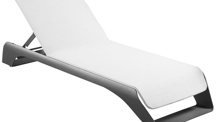 Modern outdoor lounger with white seat and black frame, perfect for patio or poolside use