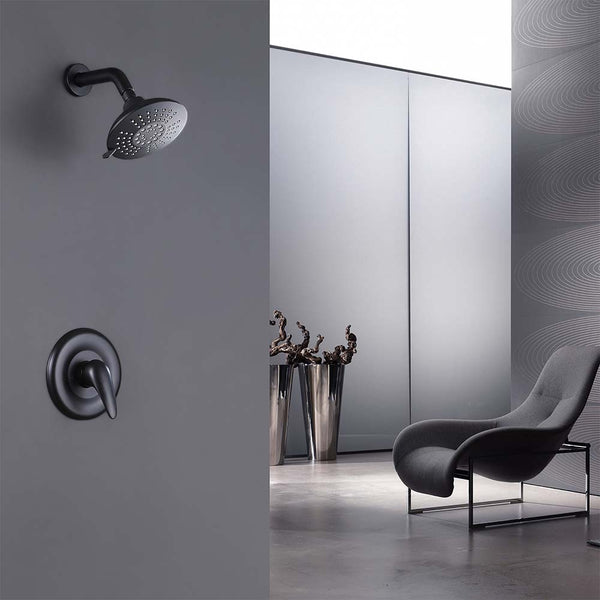 Modern shower system with wall mounted rain showerhead and handle