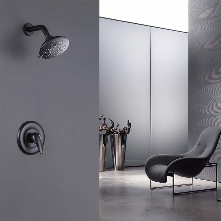 Modern shower system with wall mounted rain showerhead and handle