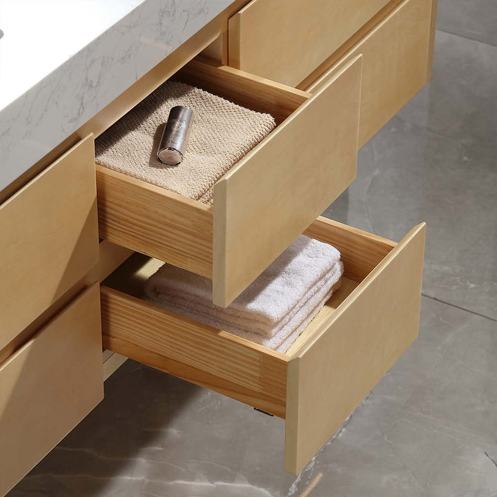 Modern vanity drawer storage with towels neatly organized inside