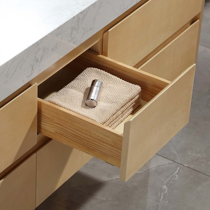 Modern vanity drawer with folded towels inside