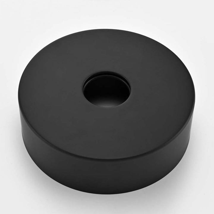 Close-up of black base plate for outdoor shower