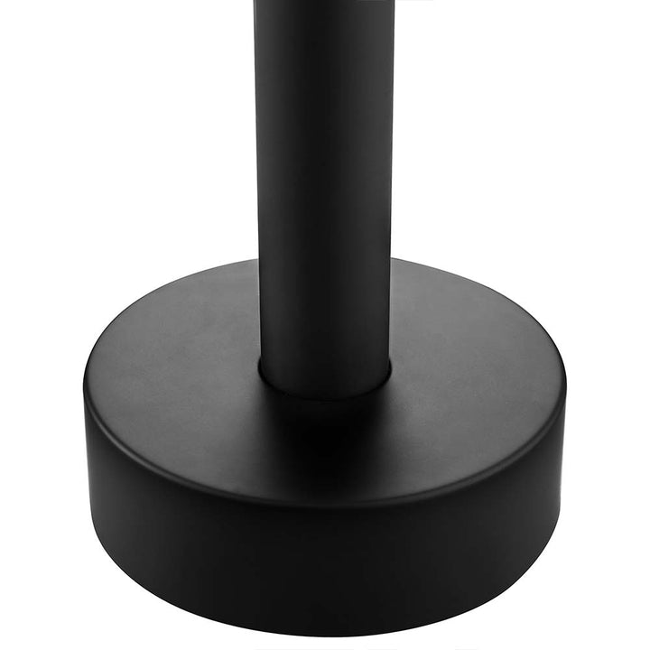 Close-up of black base of stainless steel outdoor shower