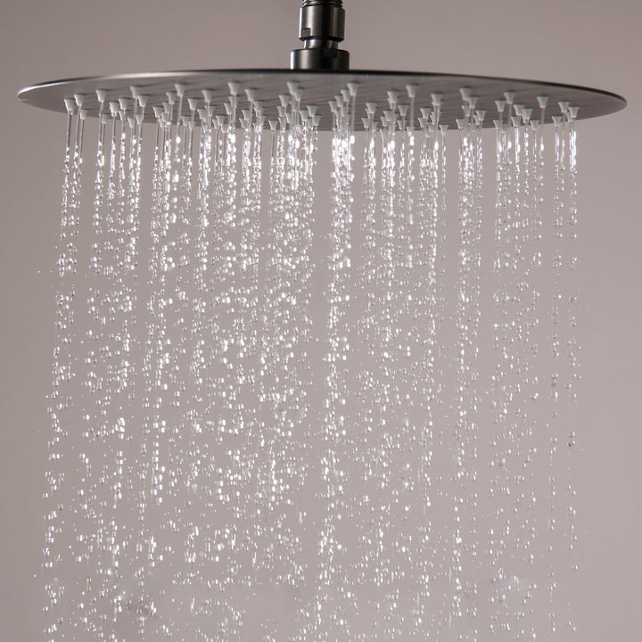 Close-up of rainfall shower head in use