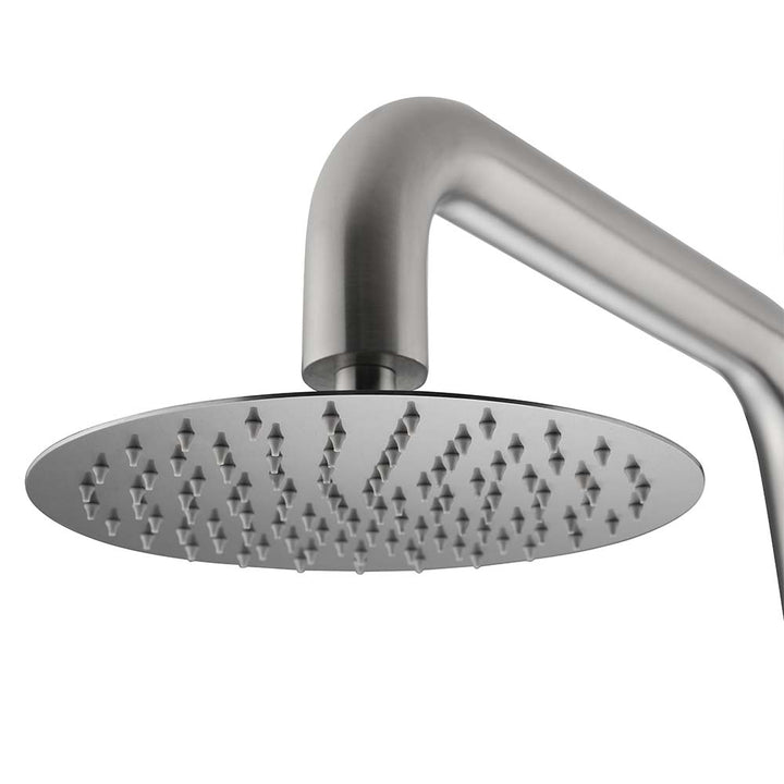 Stainless steel outdoor shower with angled rainhead for a luxurious outdoor bathing experience