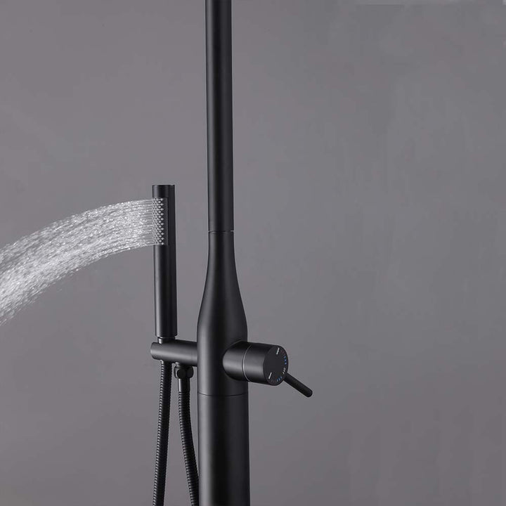 Black outdoor hand shower spraying water