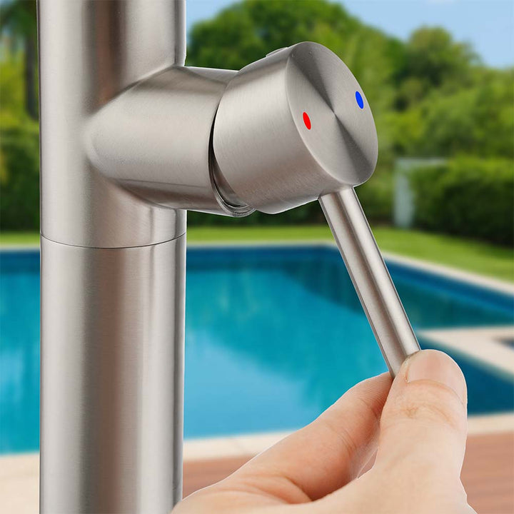 Stainless steel outdoor shower temperature control handles with red and blue indicators