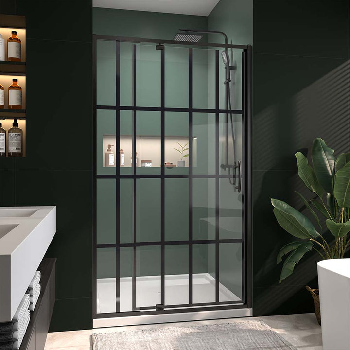 Pivot shower door with black frame in dark modern bathroom interior