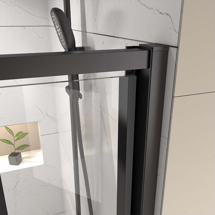 Pivot shower door close-up detail of metal frame and tempered glass connection
