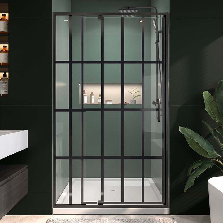 Pivot shower door front view with black frame in dark modern bathroom