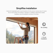 Installer mounting a RezeFlow P7 cellular shade above a wide window.