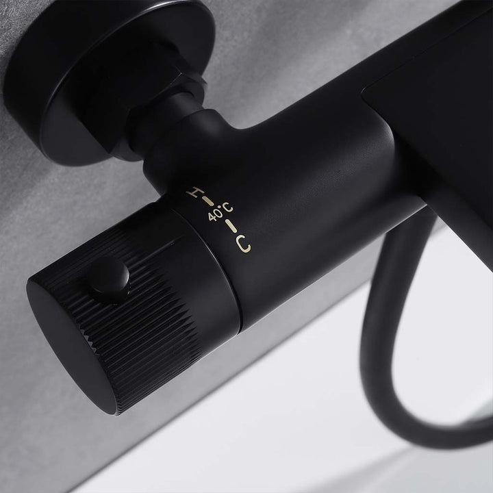 Black shower system thermostatic control knob with 40°C safety mark