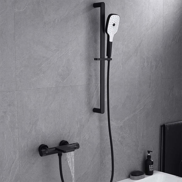 Black shower system wall mounted with hand shower and faucet running water