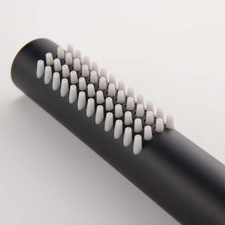 Close-up of handheld spray head for modern shower system