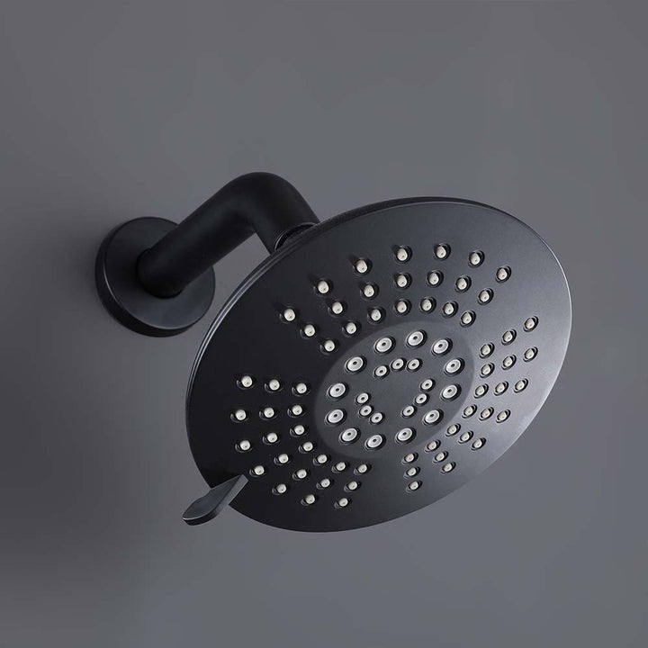 Close up detail of black rain showerhead from modern shower system