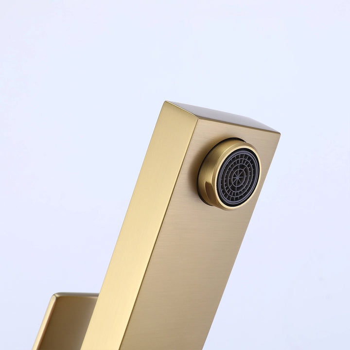 Single hole faucet spout aerator detail in brushed gold finish