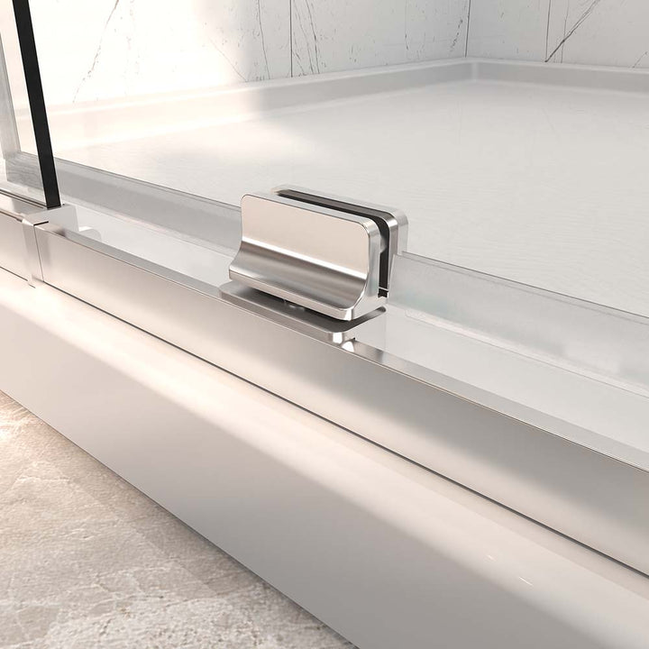 Sliding shower door brushed nickel bottom guide close-up