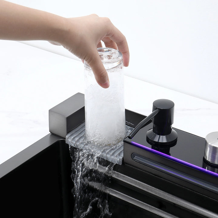 Smart kitchen sink cup rinser with waterfall cleaning feature