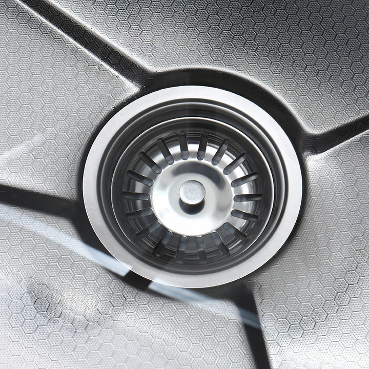 Smart kitchen sink stainless steel drain detail with hex texture