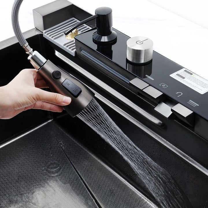 Smart kitchen sink pull down faucet showing dual spray function