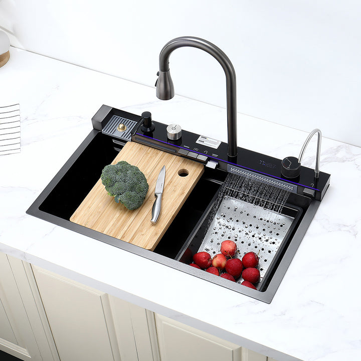 Smart kitchen sink with cutting board faucet and drain basket in use