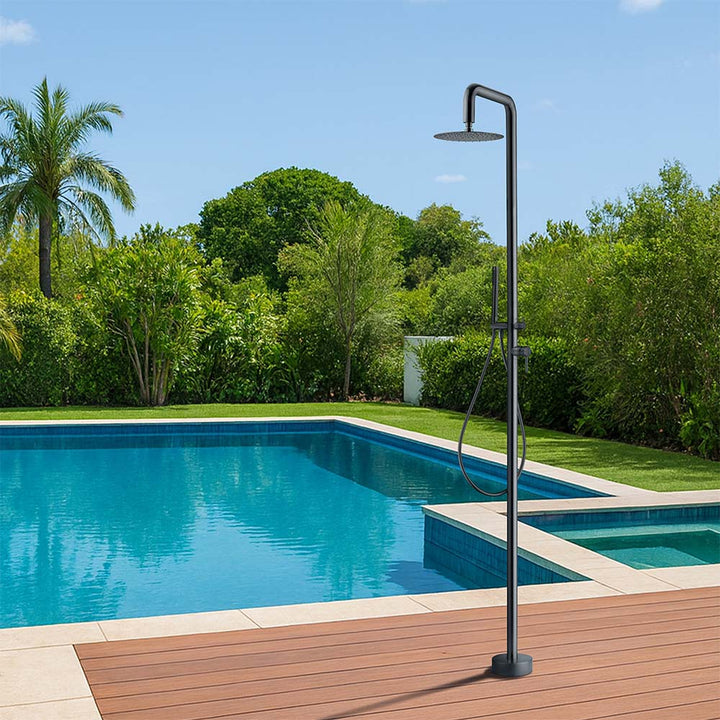 Black stainless steel outdoor shower with handheld by pool