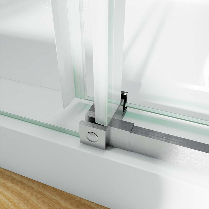 Shower door bottom track with stainless steel guide and seal