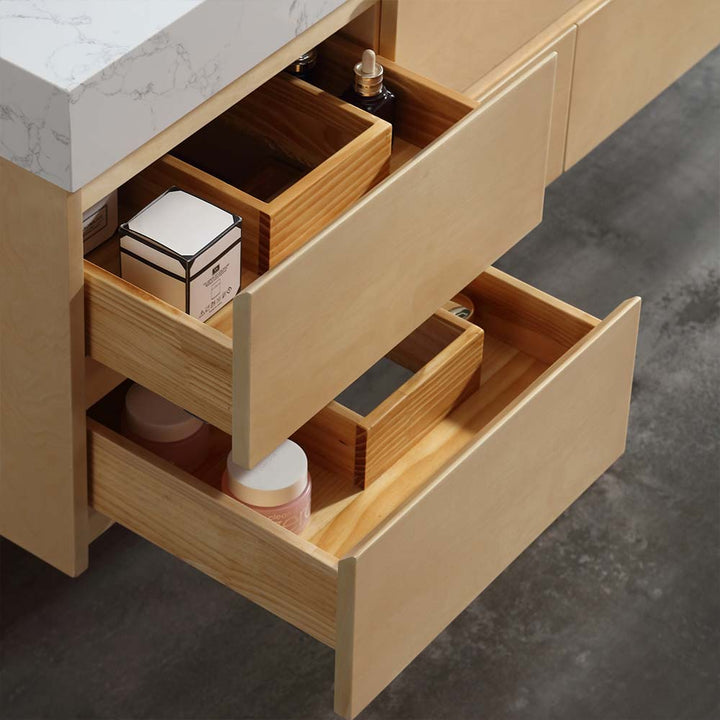 Storage drawers with wooden dividers in marble vanity top