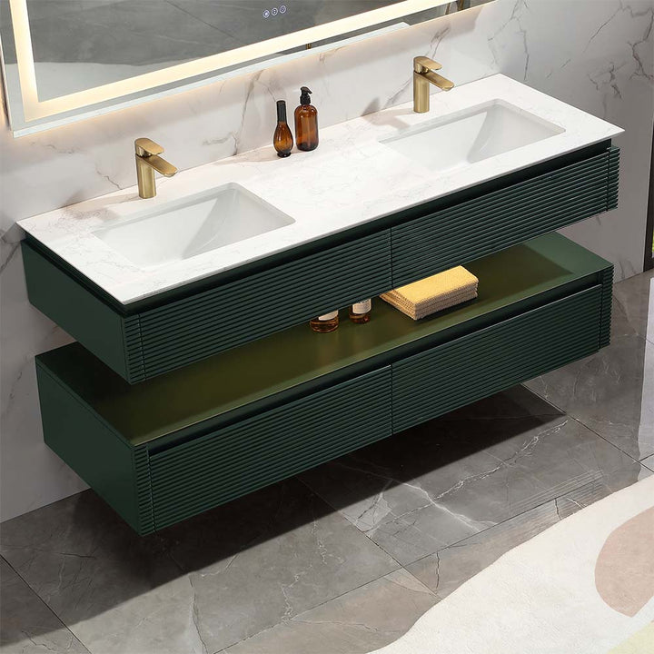 Wall mounted green double sink vanity with marble top and gold faucets
