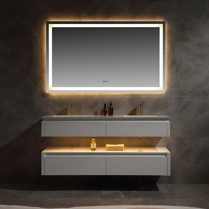 White wall mounted bathroom vanity with LED mirror in night lighting