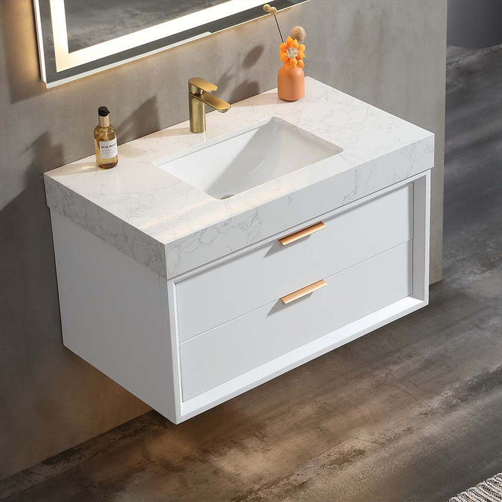 White wall mounted bathroom vanity with marble countertop closeup view
