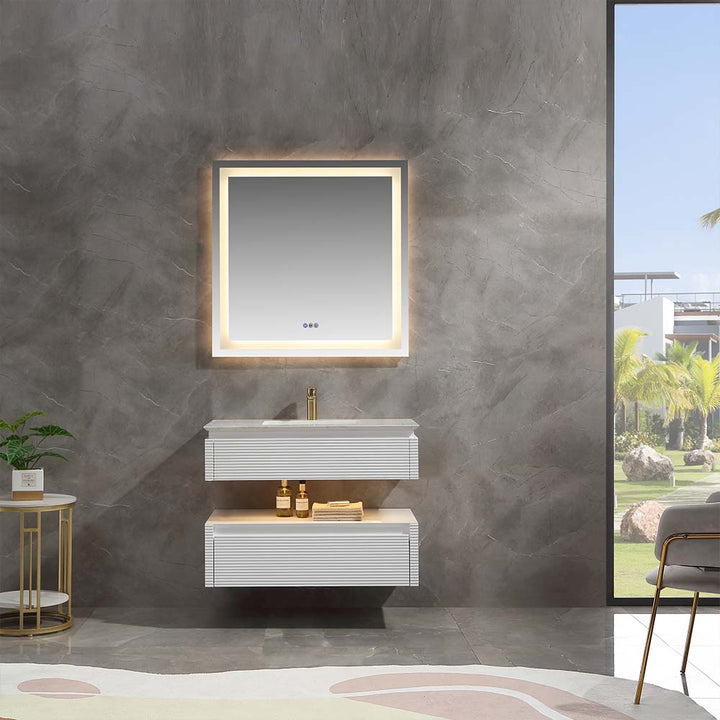 White wall mounted bathroom vanity with single sink and LED mirror