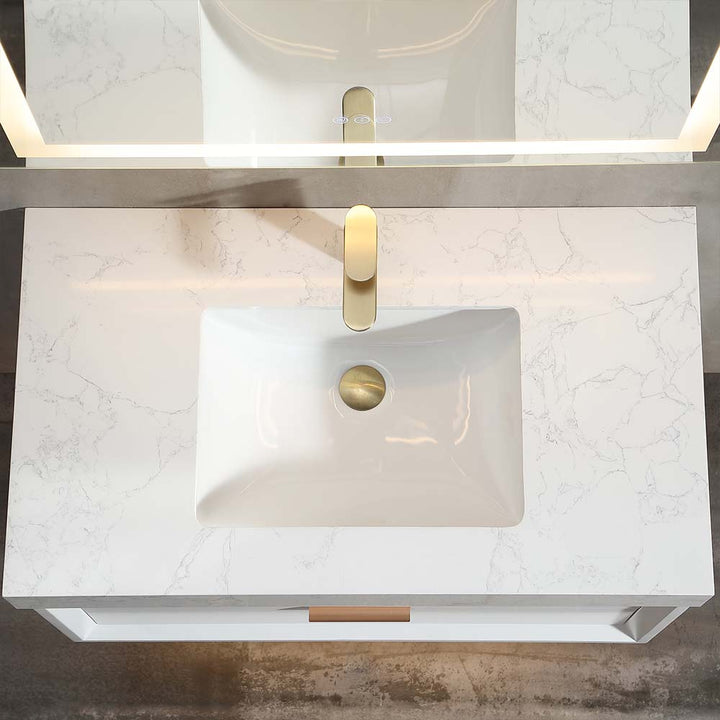 White wall mounted bathroom vanity with marble top and ceramic sink